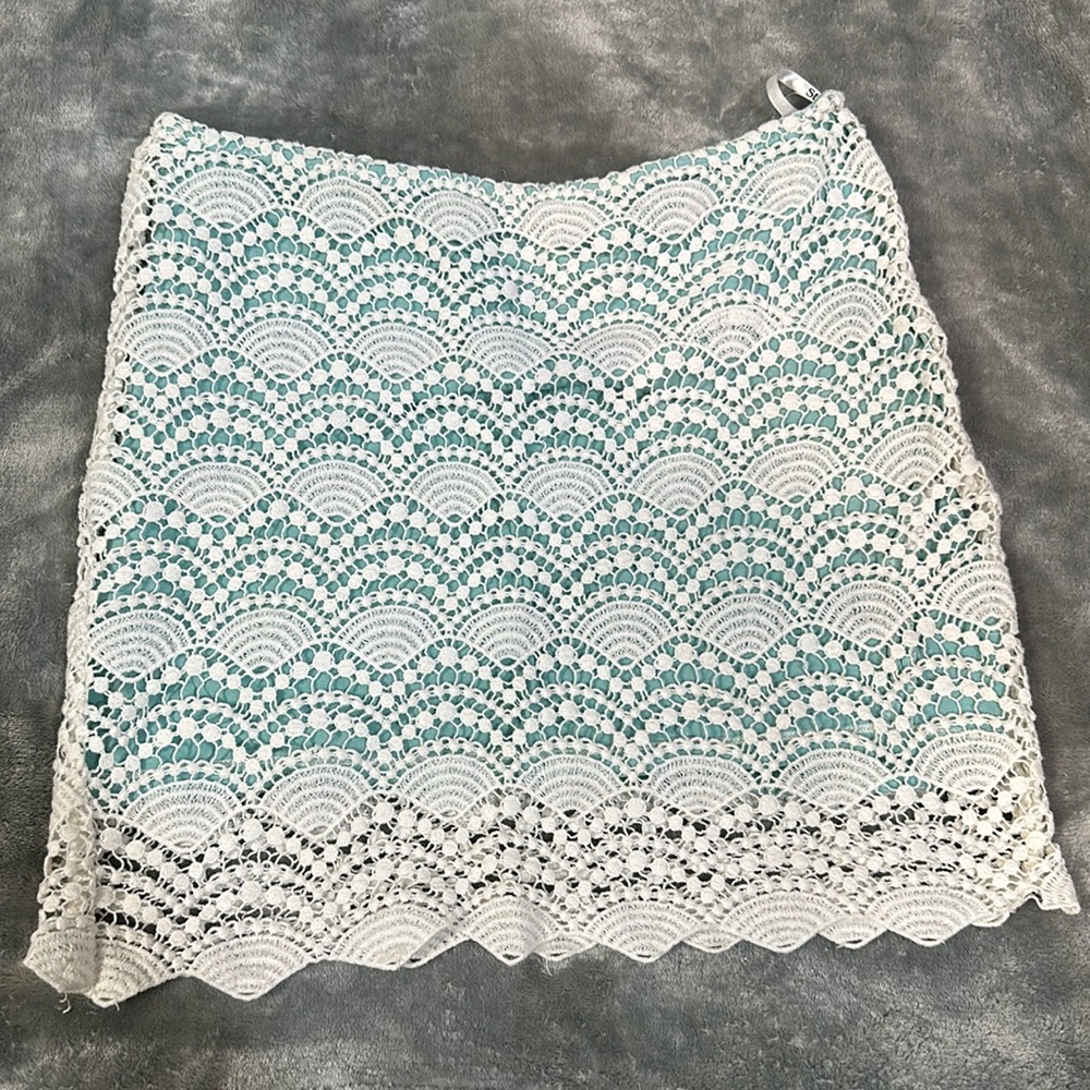 Early 00’ crochet skirt, turquoise lining contrasting beautifully white crochet